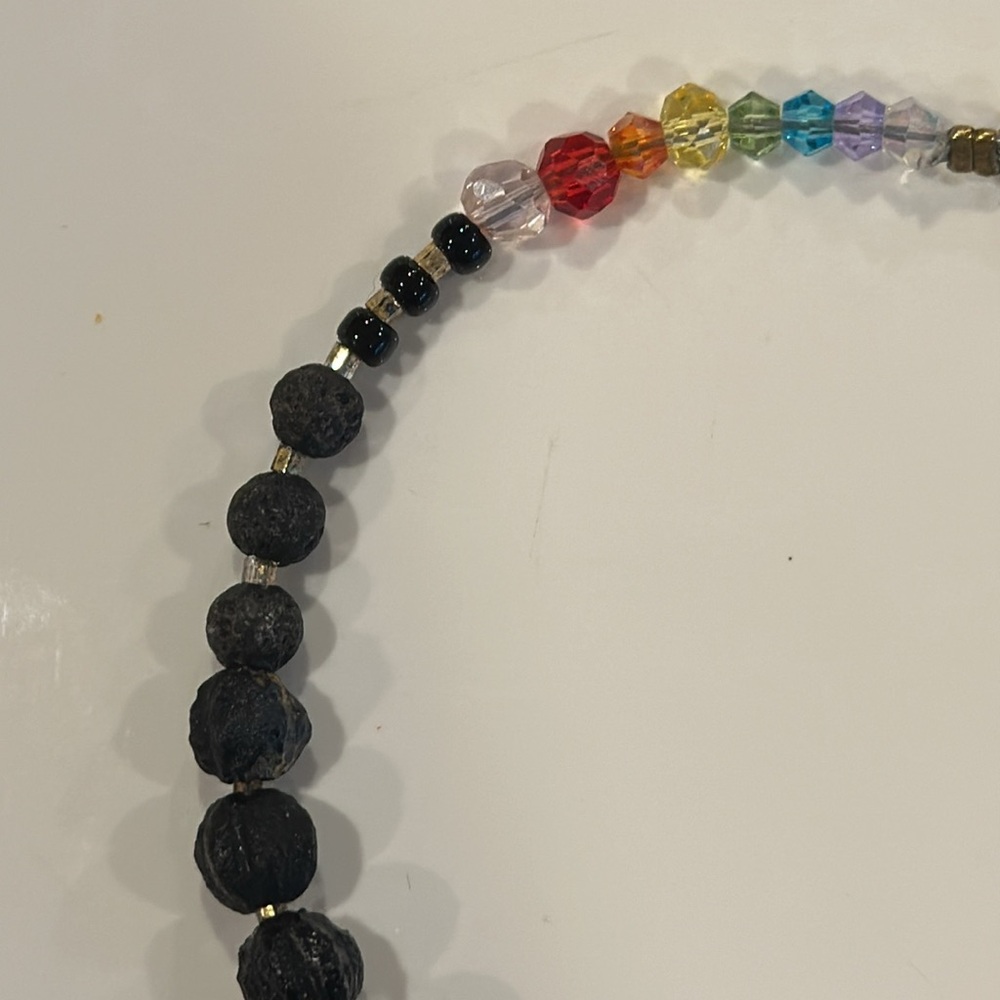 Authentic rainbow-colored crystals and lava bead bracelet. Handcrafted.
